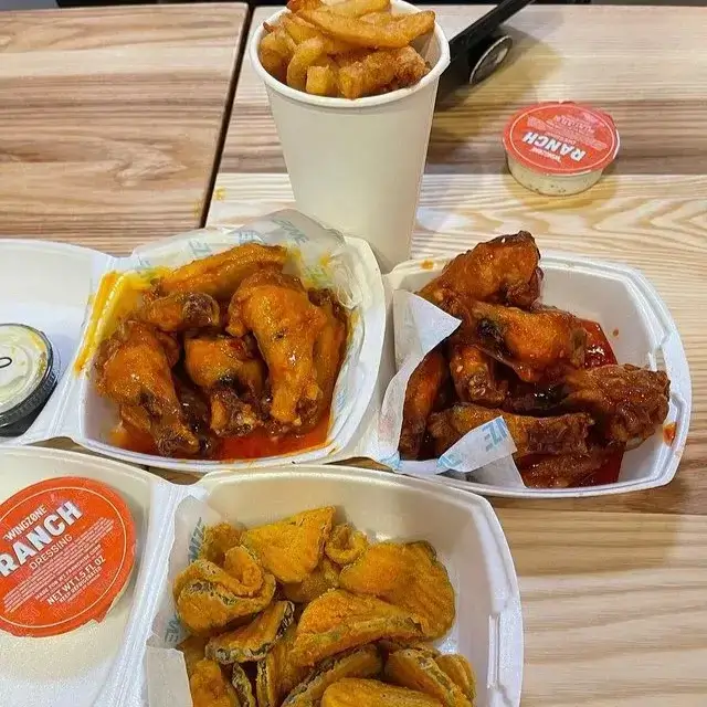 some crispy sticky wings , Thai style spicy sweet sauce, and choice of boneless or classicsome crispy sticky wings , Thai style spicy sweet sauce, and choice of boneless or classic