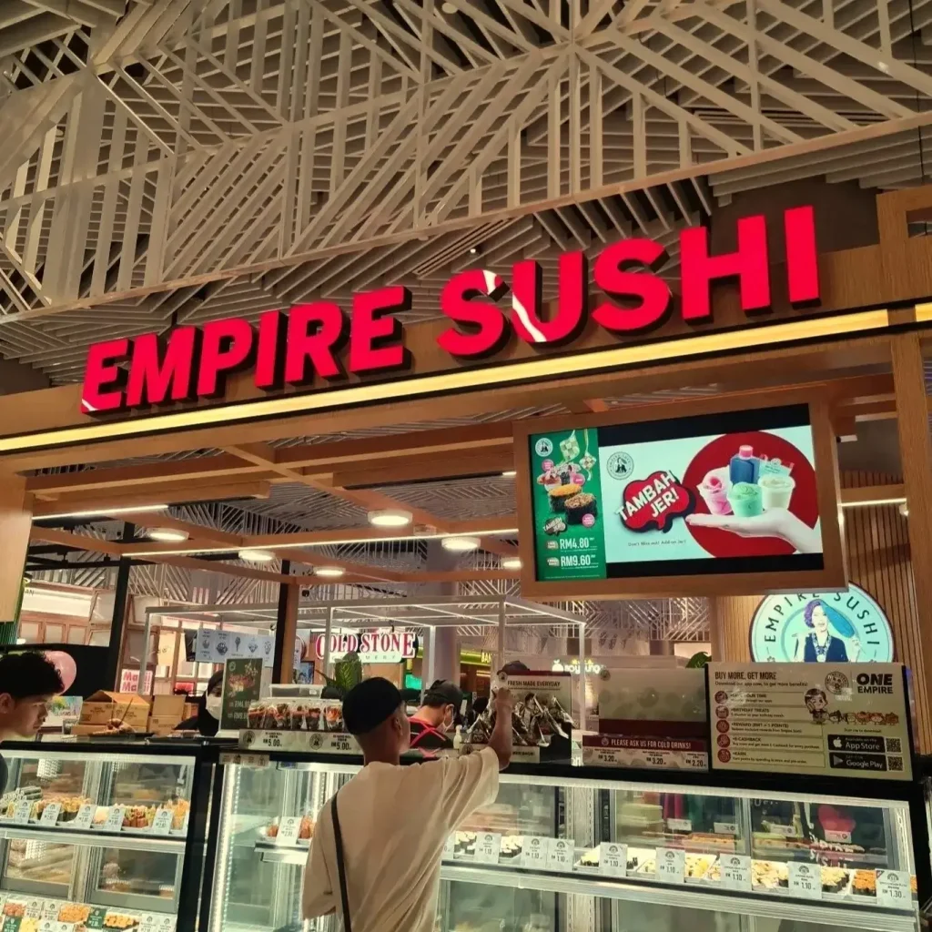 Empire Sushi in Outlet Image Standing in front